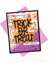 Handmade greeting card with halloween postage on it and trick or treat sentiment on it.