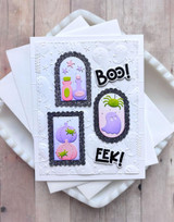 Handmade greeting card with frames on it and pumpkins, potions, and ghosts with boo and eek sentiments on it.