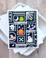 Handmade greeting card with ghost, witches hat, pumpkin, and frog sentiment on it.