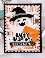 Handmade greeting card with ghost on it and happy haunting from the boo crew sentiment on it.