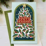 Handmade greeting card with Christmas tree on it and happy holidays sentiment on it.
