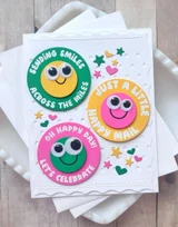 Handmade greeting card with smiley faces on it and various sentiments on each.