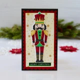 Handmade greeting card with nutcracker on it and Merry Christmas sentiment on it.