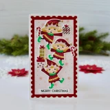 Handmade greeting card with elves on it and Merry Christmas sentiment on it.