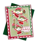 Handmade greeting card with elves on it and sending holiday cheer sentiment on it.