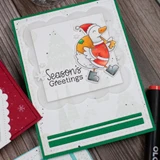 Handmade greeting card with Christmas Goose on it and season's greetings sentiment on it.