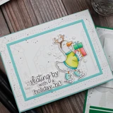 Handmade greeting card with Christmas Goose on it and skating by with a holiday hi sentiment on it.