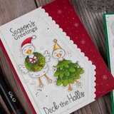 Handmade greeting card with Christmas Goose on it and season's greeting, deck the halls sentiment on it.