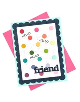 Handmade greeting card with dots on it and hello friend sentiment on it.