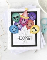 Handmade greeting card with balloon on it and party hat with hooray sentiment on it.