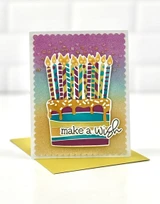 Handmade greeting card with cake on it and make a wish sentiment on it.