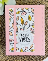 Handmade greeting card with leaves on it and cozy vibes sentiment on it.