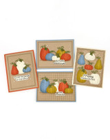 Four handmade greeting cards with pumpkins on each and various fall sentiments on each.