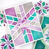 Handmade greeting card with snowflake pattern on it and 'tis the season sentiment on it.