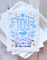 Handmade greeting card with joy to the world sentiment on it and stars on it.