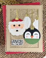 Handmade greeting card with Christmas ornaments on it and jingle all the way sentiment on it.