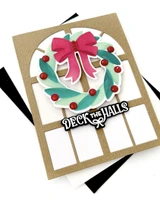 Handmade greeting card with wreath on it and deck the halls sentiment on it.