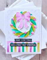 Handmade greeting card with wreath on it and merry everything, have a holly jolly Christmas sentiment on it.