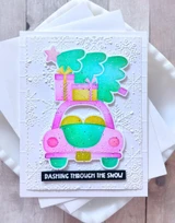 Handmade greeting card with car and tree on it and dashing through the snow sentiment on it.