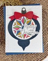 Handmade greeting cards with ornament on it and merry Christmas sentiment on it.
