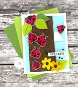 Handmade greeting card of lady bugs on a tree with hey, lady sentiment on it.