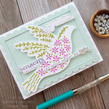 Handmade greeting card with dove on it and various holiday sentiments on it.