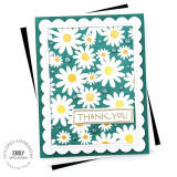 Handmade greeting card with flowers on it and thank you sentiment on it.