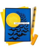 Handmade greeting card with a moon on it and bats with happy fright night sentiment on it.