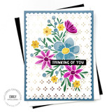 Handmade greeting card with flowers on it and thinking of you sentiment on it.