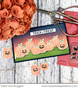 Handmade greeting tag with pumpkins on it and trick or treat sentiment on it with crafting materials in background. Handmade greeting tag with pumpkins on it and trick or treat sentiment on it with crafting materials in background.