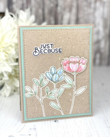 Handmade greeting card with three flowers on it and just because sentiment on it.