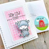 Handmade greeting card with a cow on it and holy cow! sentiment and it's an udder birthday sentiment on it with a happy mail sticker next to it of a farm.