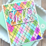 Handmade greeting card with argyle pattern on it and hello sentiment on it.