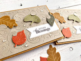 Handmade greeting card with leaves and swirls on it with autumn blessings sentiment on it.