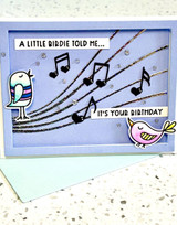 Handmade greeting card with birds on it and a little birdie told me it's your birthday sentiment on it.