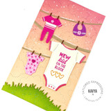 Handmade greeting ard with onesie on it and new kid on the block sentiment on it.