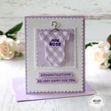 Handmade greeting card with onesie on it and mini boss sentiment on it.