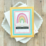 Handmade greeting card with a rainbow on it and thanks a million sentiment on it.