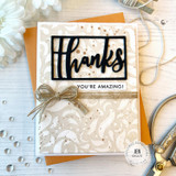 Handmade greeting card with swirls on it and thanks you're amazing sentiment on it.