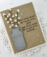 Handmade greeting card with flowers in a vase and joyful sentiment on it.