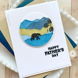 Handmade greeting card with mountains and bear on it with happy father's day sentiment on it.
