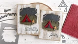 Two handmade greeting cards with tents and a fire on them with different traveling sentiments on each.