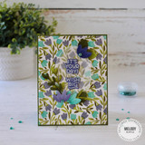 Handmade greeting card with it's your day and wish big sentiments on it with flowers in background.