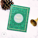 Handmade greeting card of mistletoes and may your days be merry and bright sentiment on it.