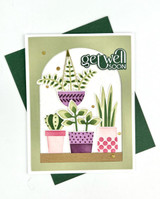Handmade greeting card with plants in pots on it with get well soon sentiment on it.