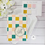 Handmade greeting card with colorful pierced grid and hello friend sentiment on it.