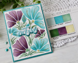 Handmade greeting card with flowers on it and happy birthday sentiment on it.