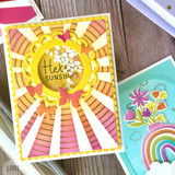 Handmade greeting card with a sun on it and hello sunshine sentiment on it .