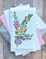 Handmade greeting card with leaves and flowers on it and grateful for you sentiment on it.
