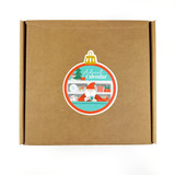 A cardboard box with Advent Calendar Sticker on it for preorders for 2025.